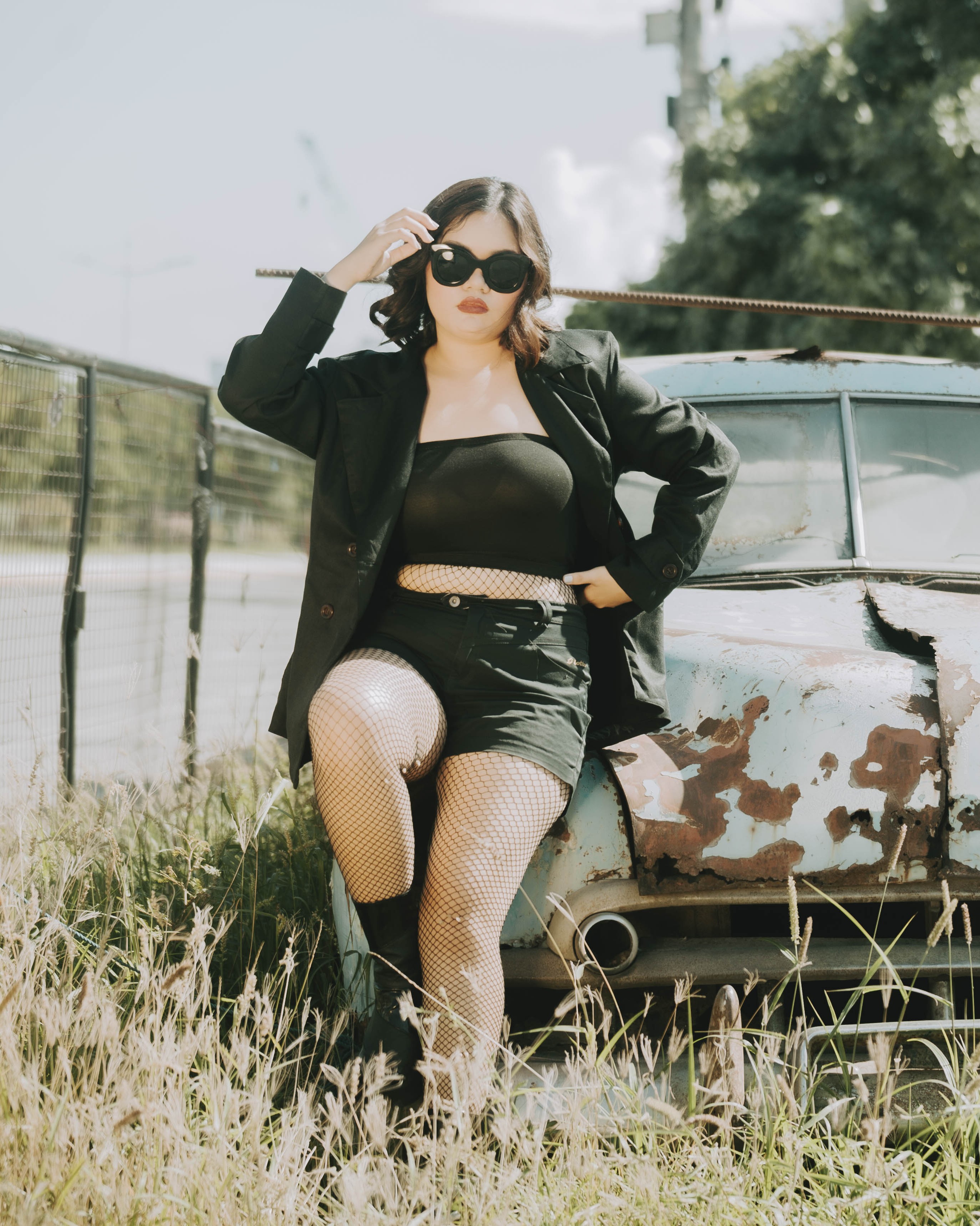Woman with vintage car
