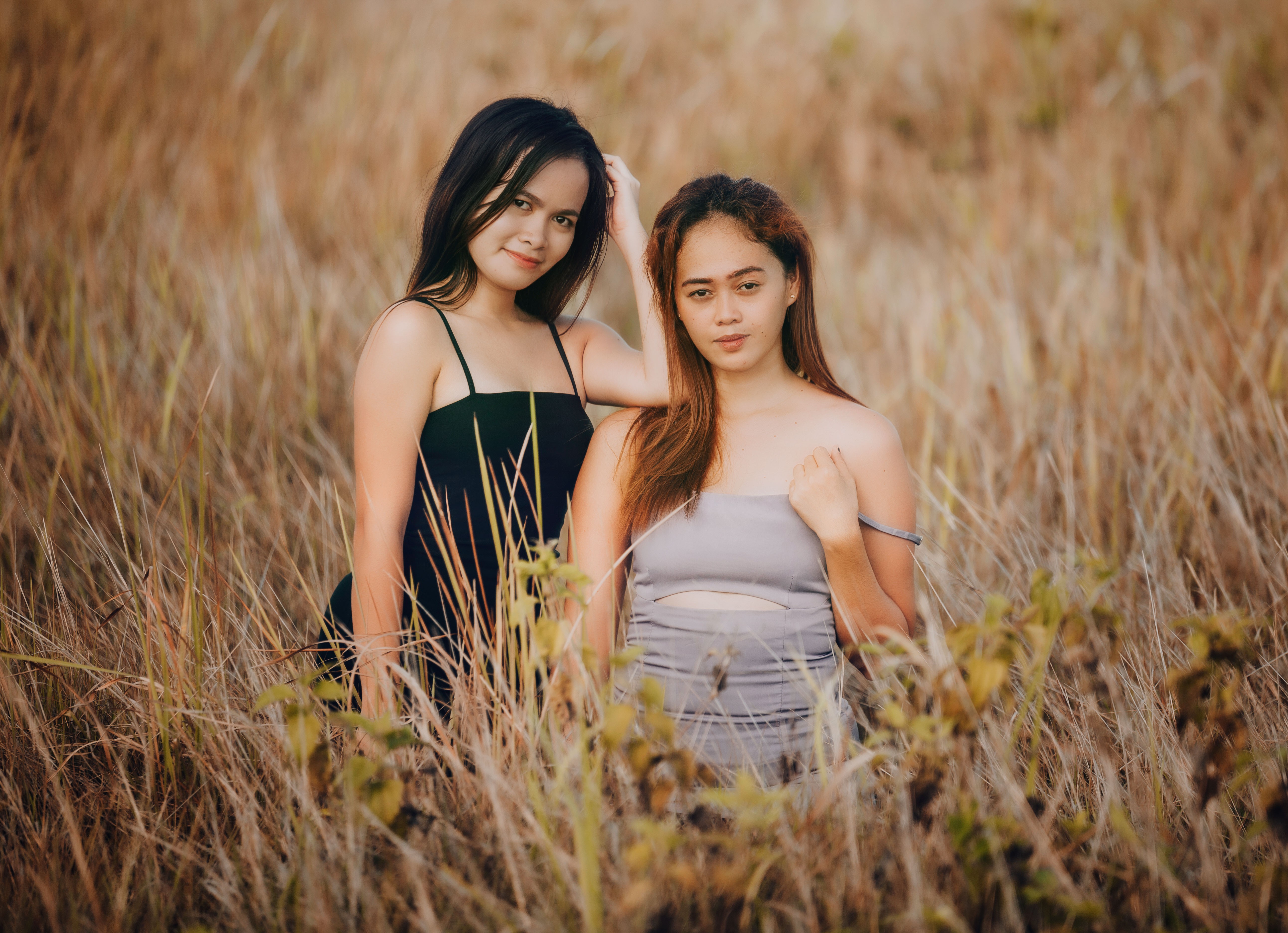 Two women in the tall grass
